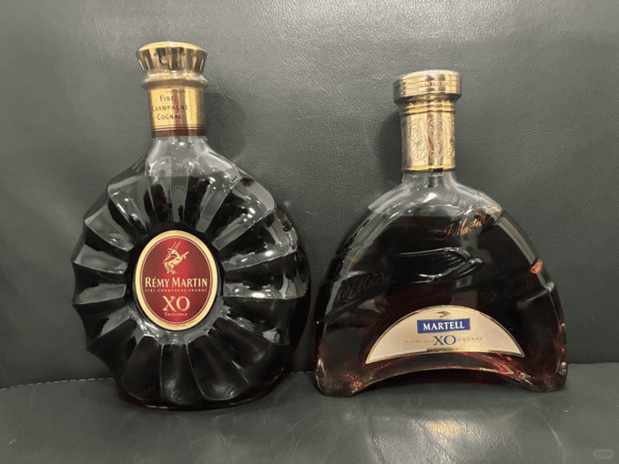 Rémy Martin XO and Martell Cognac bottle, labels and packaging for storage and fill-level review