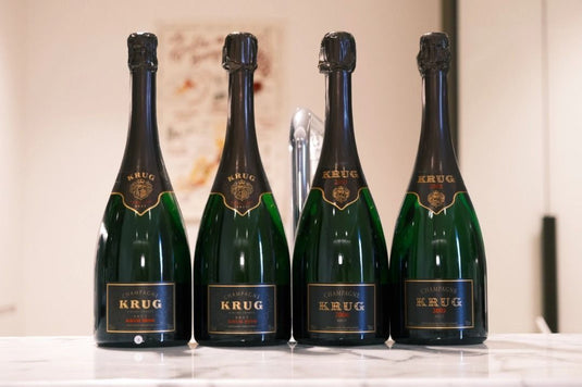 Krug Champagne bottles, labels and packaging prepared for edition and condition review