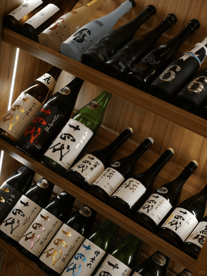Japanese Sake bottles, labels and packaging prepared for edition and condition review